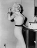 Jayne Mansfield Posed in White Keyhole-Neck Sleeveless Silk Dress and Black Waist Belt with Black Bracelet on the Right Wrist Photo Print - Item # VARCEL685377