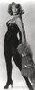 Ann-Margaret wearing a tight dress and stockings Photo Print - Item # VARCEL685478