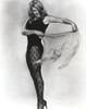 Ann-Margaret holding her blouse like a bull fighter Photo Print - Item # VARCEL685488