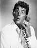 Dean Martin looking surprised while talking on a telephone Photo Print - Item # VARCEL685583
