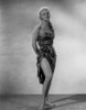 Virginia Mayo standing in Dress Photo Print - Item # VARCEL685702