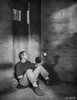 Steve McQueen sitting at the Corner Scene Excerpt from Film in Black and White Photo Print - Item # VARCEL685819