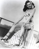 Ann Miller sitting on the Railings Photo Print - Item # VARCEL685972