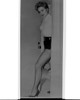 Kim Novak posing in a doorway Photo Print - Item # VARCEL686484