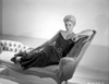 Kim Novak Lying on Bench in Black Gown Portrait Photo Print - Item # VARCEL686517