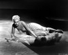 Kim Novak lying down in a gown Photo Print