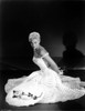 Kim Novak kneeling in a gown Photo Print - Item # VARCEL686554