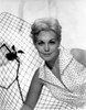 Kim Novak leaning Photo Print - Item # VARCEL686556