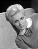 Kim Novak Leaning on Couch Black and White Photo Print - Item # VARCEL686569