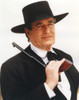 Hugh O'Brien wearing a Black Suit and Hat with Pistol Photo Print - Item # VARCEL686622