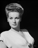 Maureen O'Hara wearing White V-neck Dress in Black Background Photo Print - Item # VARCEL686660