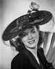 Maureen O'Hara Posed in Black Dress With Hat Photo Print - Item # VARCEL686691