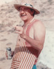 Randy Quaid smiling while Holding Cigar and Beer Photo Print - Item # VARCEL686995