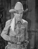Tex Ritter aiming revolvers Photo Print - Item # VARCEL687122