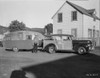 Tex Ritter beside his trailer Photo Print