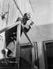 Edward Robinson Holding Pipe in Classic Photo Print - Item # VARCEL687173