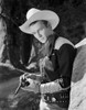 Roy Rogers posed in Cowboy Outfit and Gun in Black and White Photo Print - Item # VARCEL687264