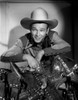 Roy Rogers smiling in Cowboy Outfit Photo Print - Item # VARCEL687266