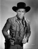 Roy Rogers posed in Cowboy Outfit and Holding a Gun Photo Print - Item # VARCEL687267