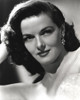 Jane Russell Portrait in White Silk Lace Dress and Pearl Earring with Right Hand on the Head Photo Print - Item # VARCEL687467
