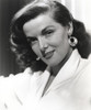 Jane Russell Portrait in White Linen Suit Dress and Gold Layered Hoop Earrings Photo Print - Item # VARCEL687517