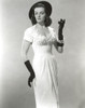 Jane Russell Posed in White Dress With Hat Photo Print - Item # VARCEL687526