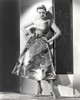 Jane Russell Posed in Silk Floral Strap Dress and High Heel Sandals with Hands on the Waist Photo Print - Item # VARCEL687527