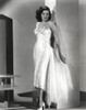 Jane Russell Posed in White Silk Strapless Dress with Fishtail Skirt and White High Heel Shoes Photo Print - Item # VARCEL687542