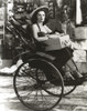 Jane Russell Riding Carousel in Black Gown Photo Print - Item # VARCEL687569