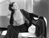Rosalind Russell Seated on Couch in Dress Photo Print - Item # VARCEL687598