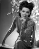 Rosalind Russell Seated and Leaning on Hand Photo Print - Item # VARCEL687596