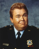 John Candy wearing an Official Uniform Portrait Photo Print - Item # VARCEL687764