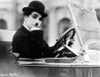Charlie Chaplin Ridding in Vehicle Photo Print - Item # VARCEL688026