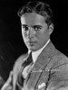Charlie Chaplin in a Gray Suit and Tie with Signature Photo Print - Item # VARCEL688035