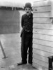 Charlie Chaplin Sneaking in Black Suit Photo Print - Item # VARCEL688043