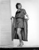 Iris Adrian wearing a checked outfit Photo Print - Item # VARCEL688050