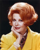 Portrait of Arlene Dahl in Yellow Coat with Gold Bracelet Photo Print - Item # VARCEL688057
