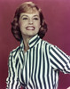 Cyd Charisse Portrait in Red Background Photo Print - Item # VARCEL688099