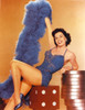 Cyd Charisse Seated in Blue Feather Shawl Photo Print - Item # VARCEL688103