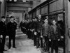 A film still of Charlie Chaplin in a jail Photo Print - Item # VARCEL688153