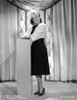 Gracie Allen leaning on a pillar Photo Print - Item # VARCEL688181