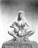 Lilly Christine holding bongo drums Photo Print - Item # VARCEL688368