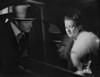 Citizen Kane Man Talking to Woman with Fur Coat in Movie Scene Photo Print - Item # VARCEL688405