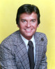 Dick Clark Portrait in Yellow Background Photo Print - Item # VARCEL688418