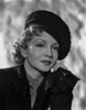 Claudette Colbert Posed in Black Suit with Head Leaning on Hand Photo Print - Item # VARCEL688502
