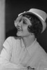 Claudette Colbert Posed Side view in White Polo shirt with Hat Photo Print - Item # VARCEL688514
