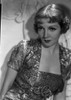 Claudette Colbert Posed in Glossy Dress with Dark lipstick Photo Print - Item # VARCEL688508