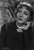 Claudette Colbert Posed in Black Dress with Hand on Neck Photo Print - Item # VARCEL688529
