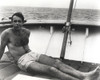Sean Connery sunbathing on a boat Photo Print - Item # VARCEL688592