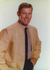 Chuck Connors Posed in Brown Coat Photo Print - Item # VARCEL688628